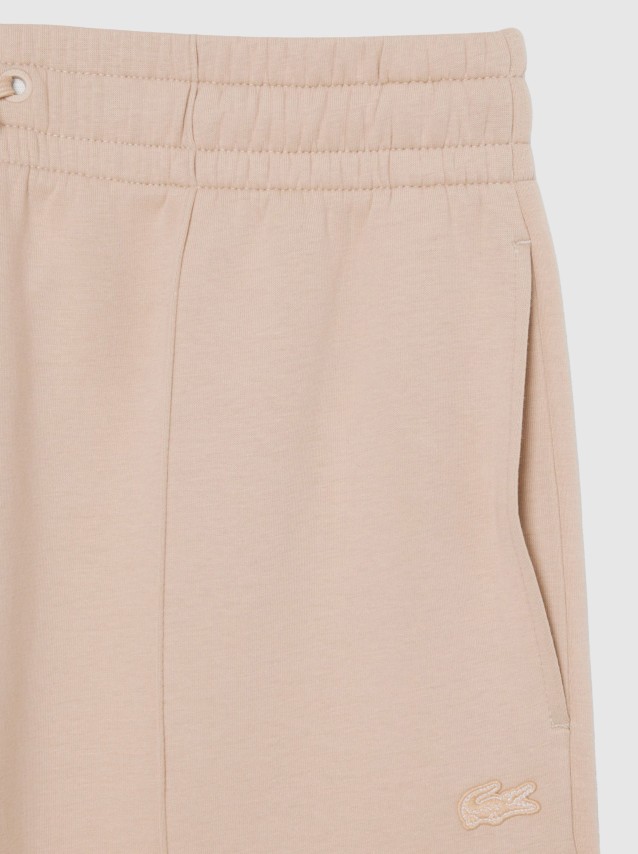 Cal�as Lacoste Mulher